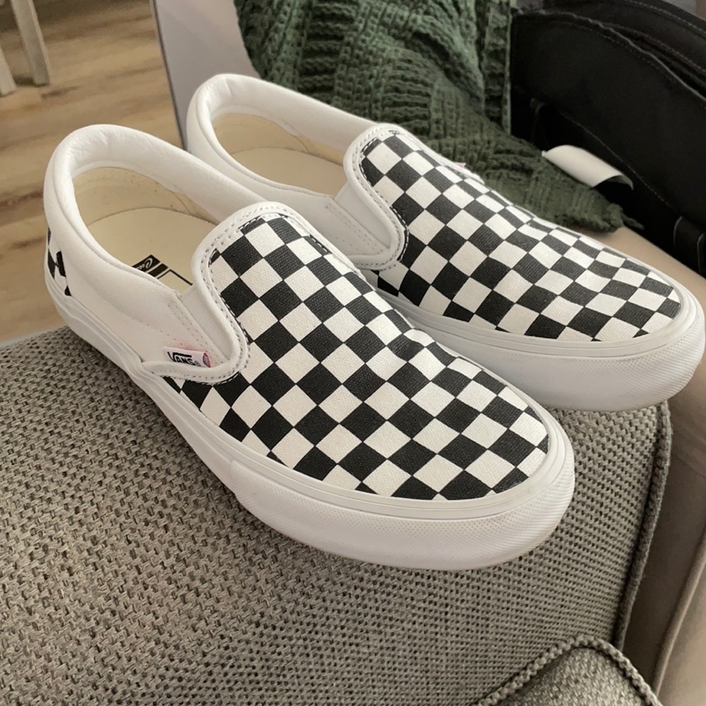 Vans black and white slip on shoes